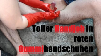 Toller Handjob in roten Gummihandschuhen